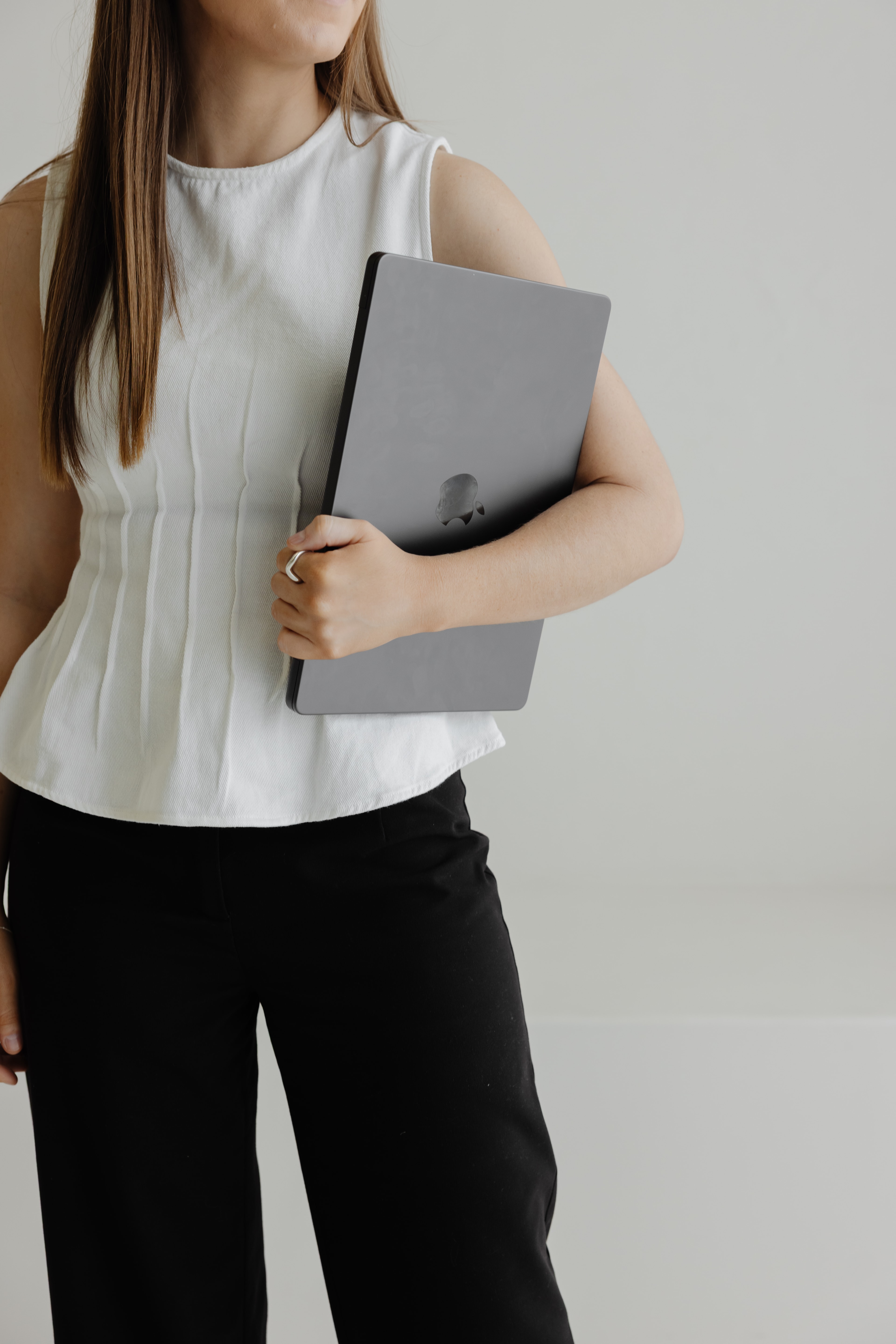 Brink team member holding laptop