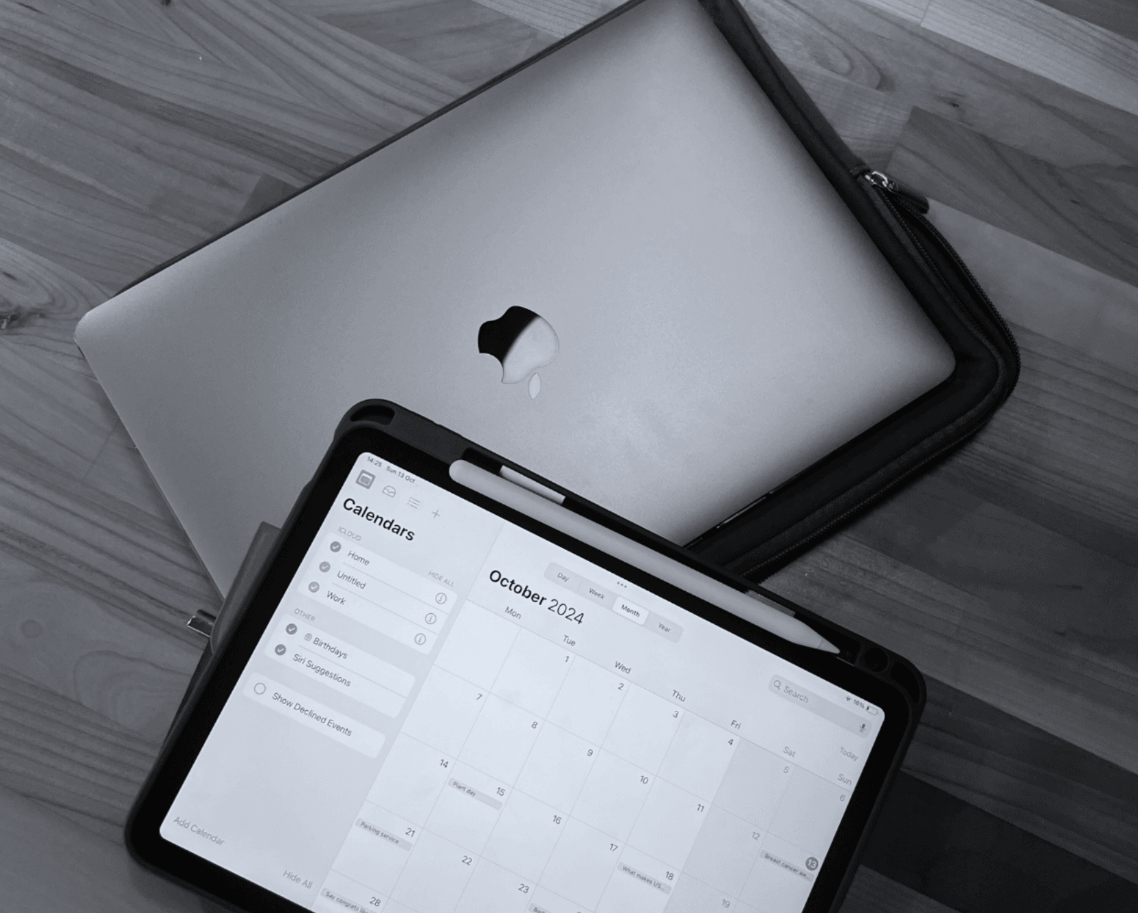 MacBook and iPad showing a calendar app