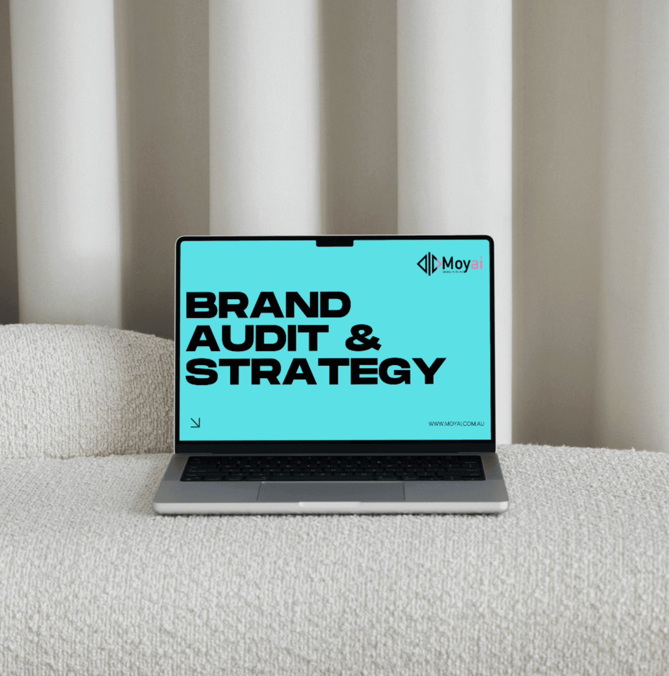 Moyai brand audit and strategy on a laptop